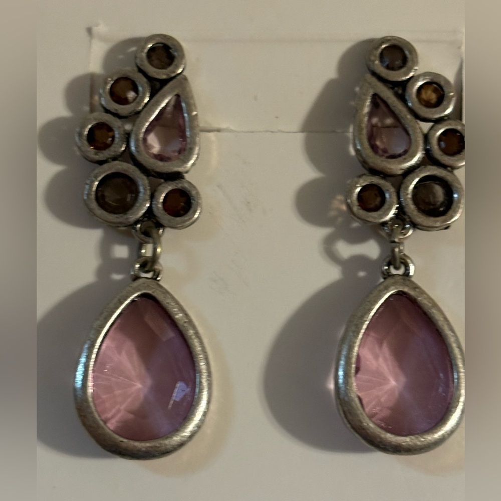 Sterling Silver earrings with purple tear drop stone.
